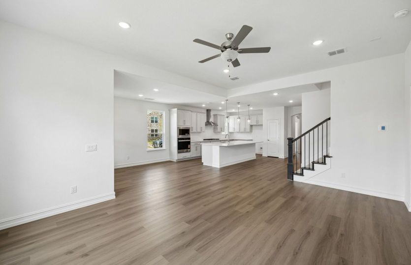 Gathering room with sigh of kitchen