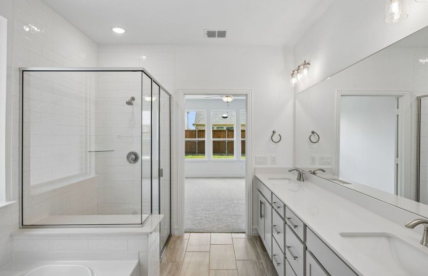 Double vanities in owners bath