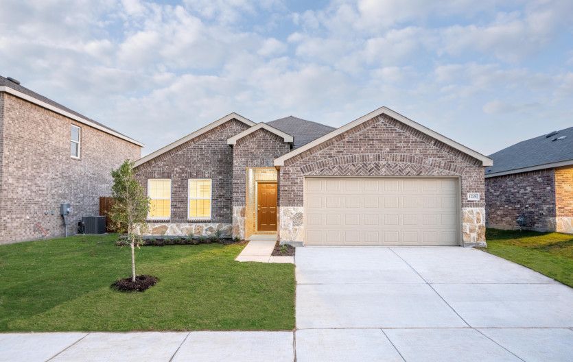 The Eastgate, a one-story home with 2 car garage, shown with Home Exterior LS201