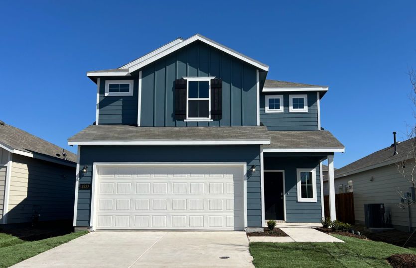 The Paluxy, a two-story home with 2-car garage *exterior features and options may vary