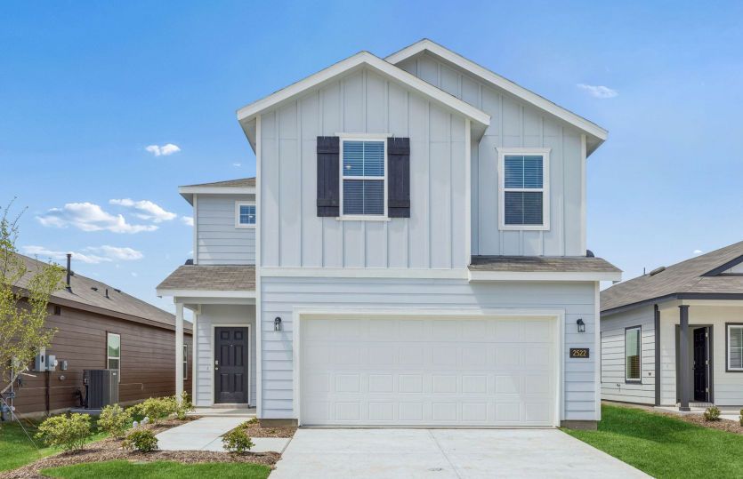 The Comal, a two-story home with 2-car garage