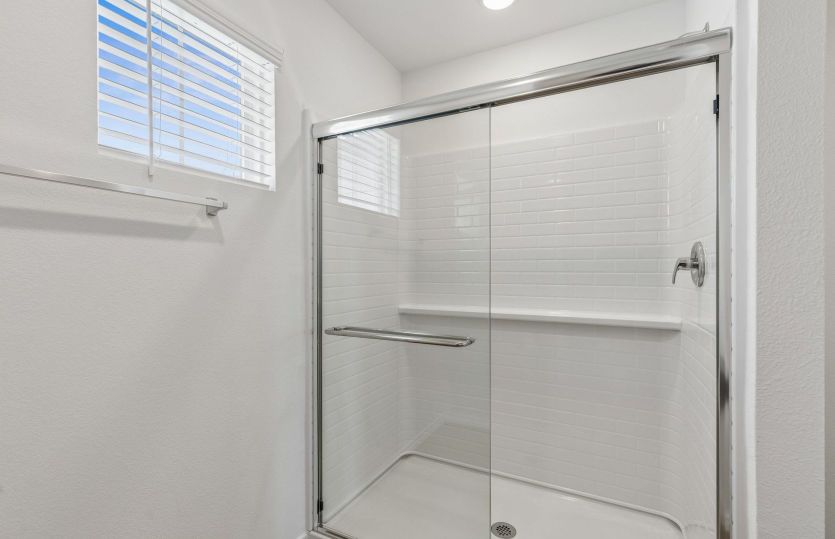 Owners bath with glass shower