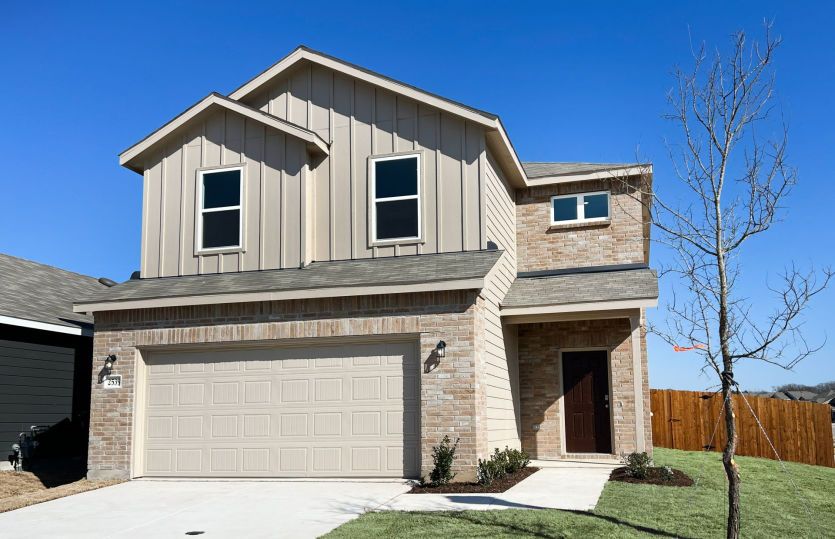 The Frio, a two-story home with 2-car garage, home exterior LS103 *exterior features may differ
