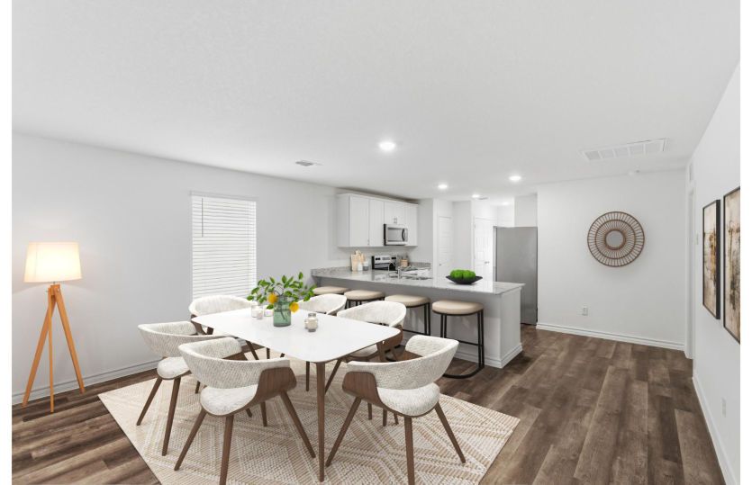 Dining area off kitchen *photo depicts features that may vary in actual home