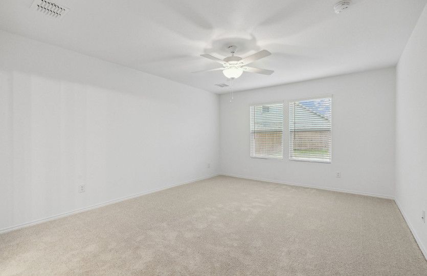 Spacious owner's suite with private bath