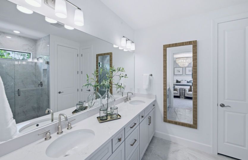 Owner's bathroom with dual sink vanity