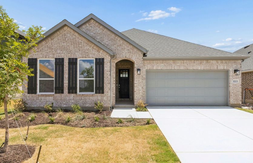 The Bell, a one-story home with 2-car garage