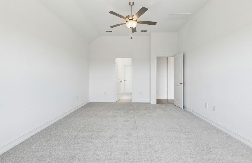 Spacious owners suite with private bath and walk in closet