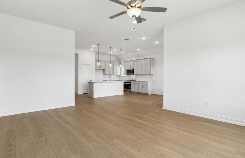 View of kitchen from main gathering room