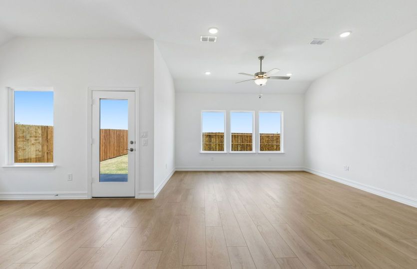 Open concept plan throughout home with beautiful flooring