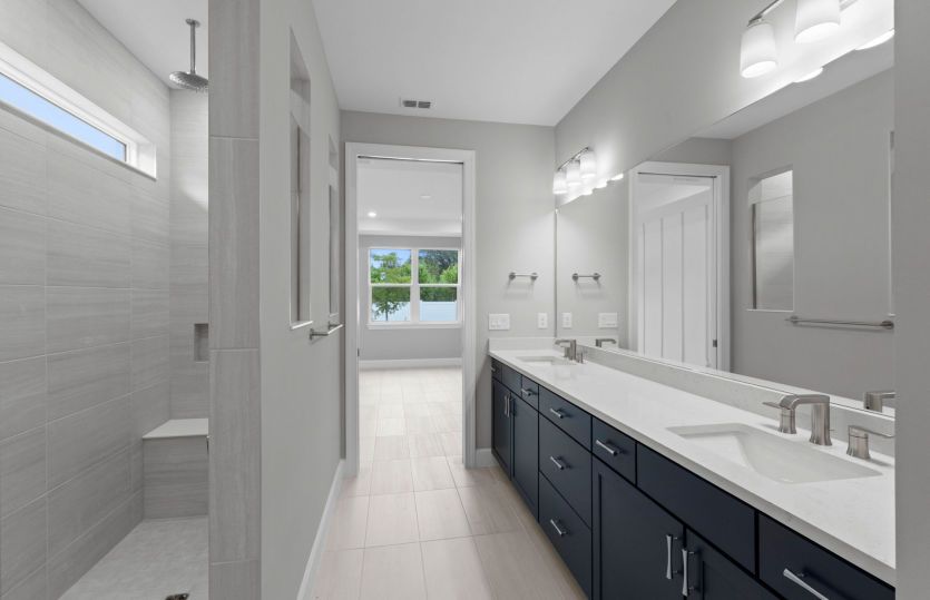 Owner's bathroom with dual-sink vanity