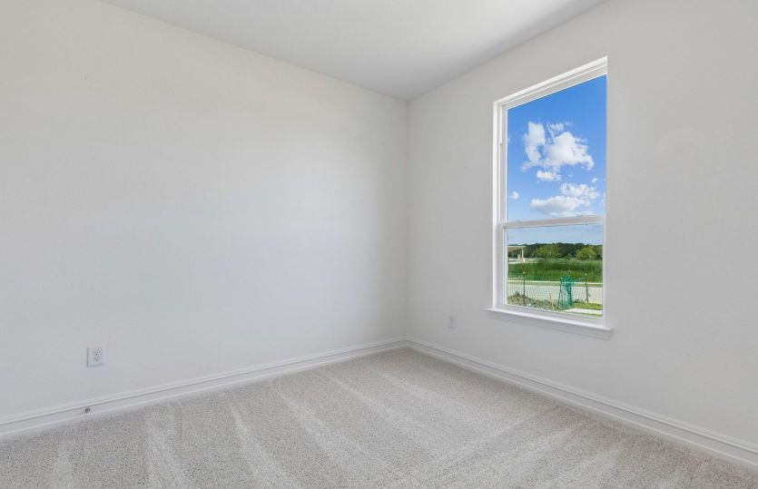 Spacious secondary bedroom off home entry