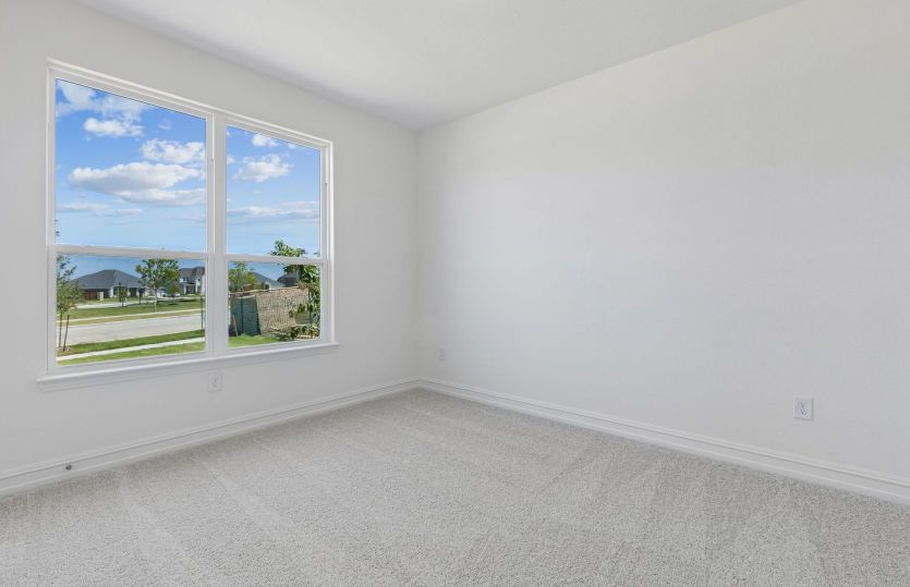 Secondary bedroom with large window