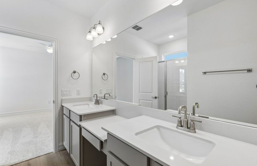 Owners private bath with double vanity