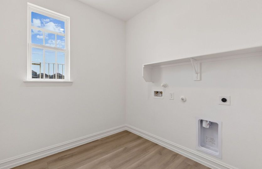 Laundry room with built in shelving