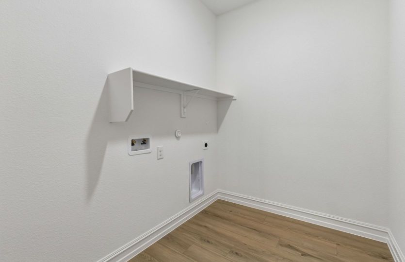 Laundry room with built in shelving