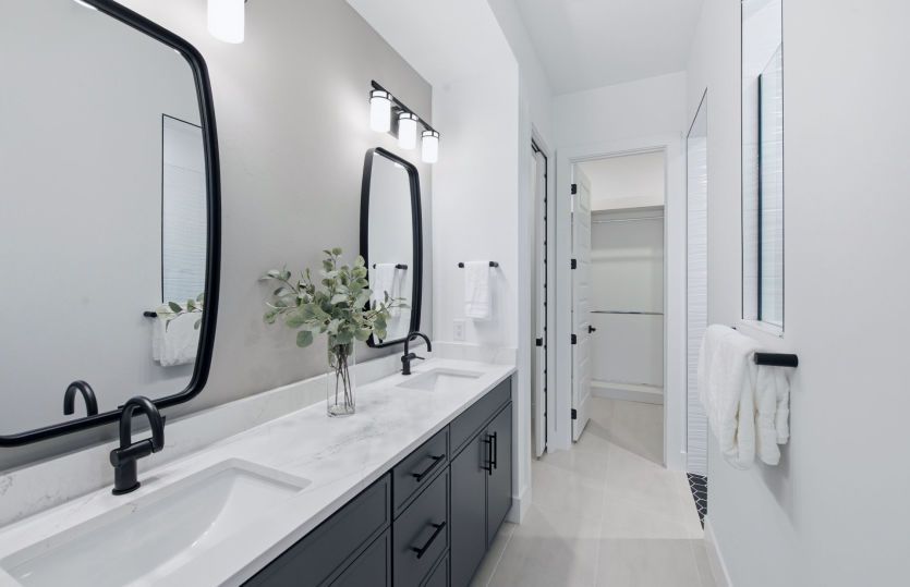 Owner's bathroom with dual sink vanity