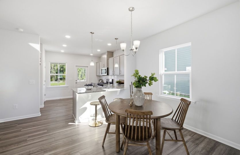 Harris #242 - Kitchen open to Everyday Eating creates Connection between the Spaces