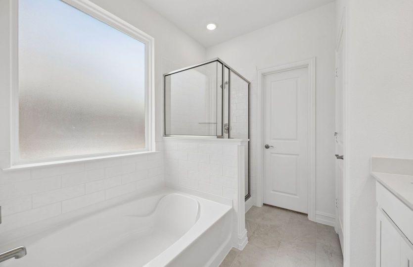 Primary bath with separate tub and shower