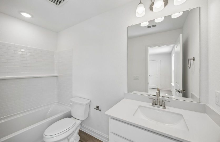 Secondary bath with tile surrounded shower