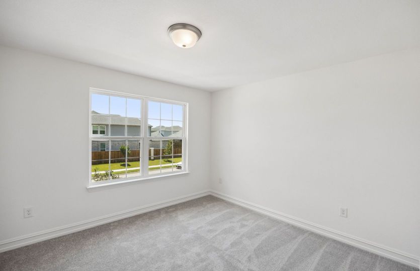 Secondary bedroom with large window