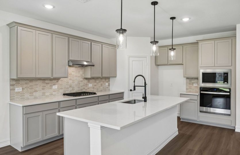 Abundant cabinet space in kitchen