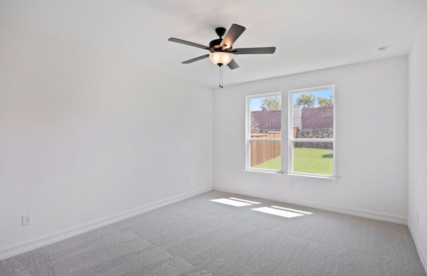 Primary suite with large window