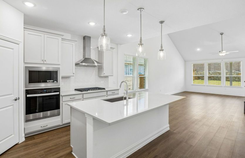 Kitchen with eat-in bartop island