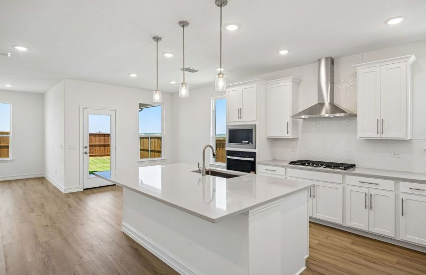 Kitchen with eat-in bartop island