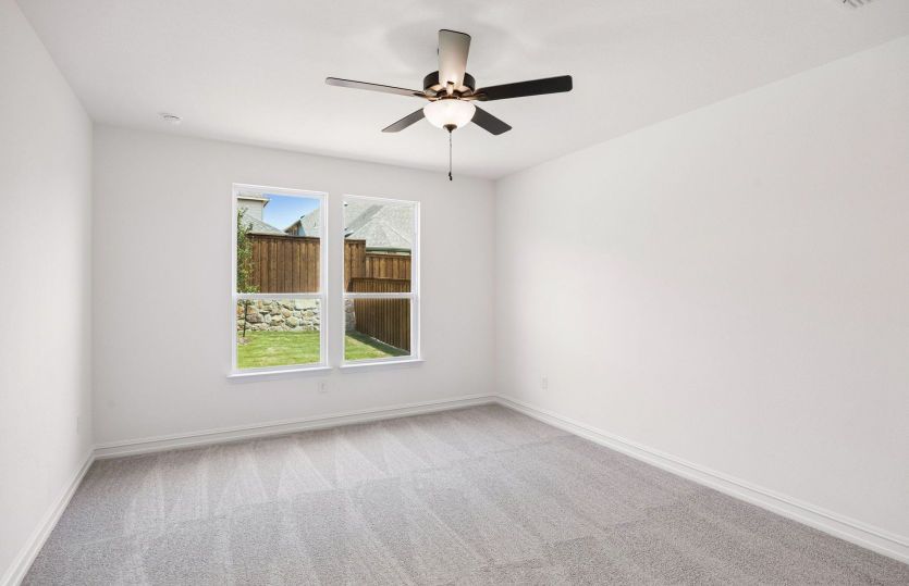 Primary suite with large windows