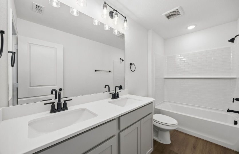 Secondary bathroom with double vanity