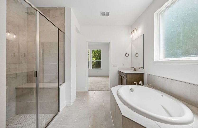Separate tub and shower in owners bath
