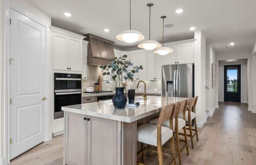 Spacious kitchen with abundant cabinet space *photos depict some features that may change