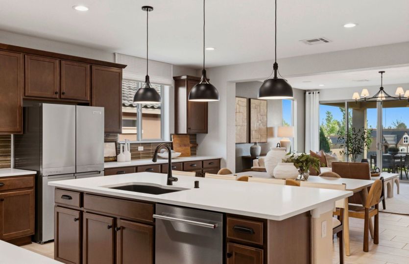 The open concept of the Barletta seamlessly connects the kitchen, café, and gathering room.