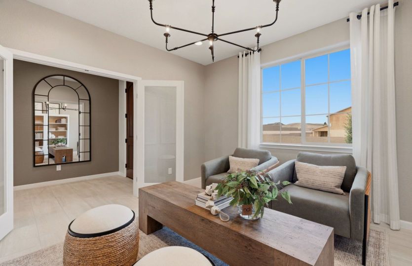 Right off the foyer, you'll find a private den/flexible living space.