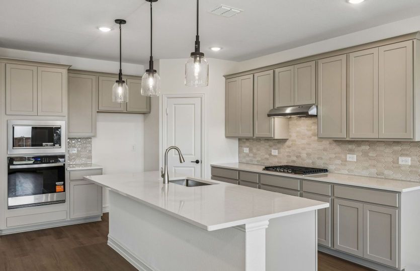 Abundant cabinet space in kitchen