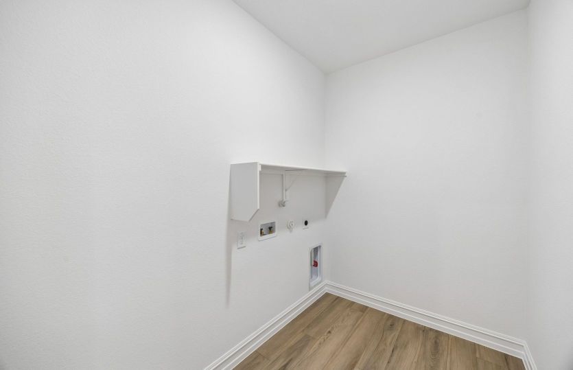 Built-in shelving in laundry room