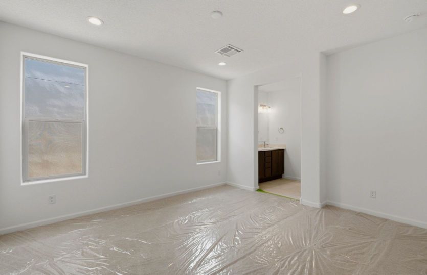 Luxurious owner's suite with oversized windows