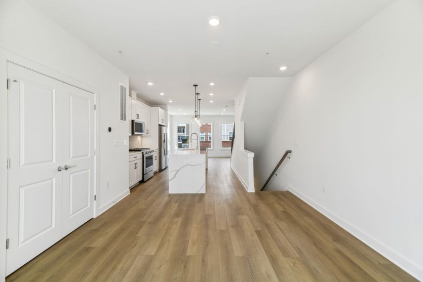 Café Opens to Kitchen and Gathering Room - Actual Home