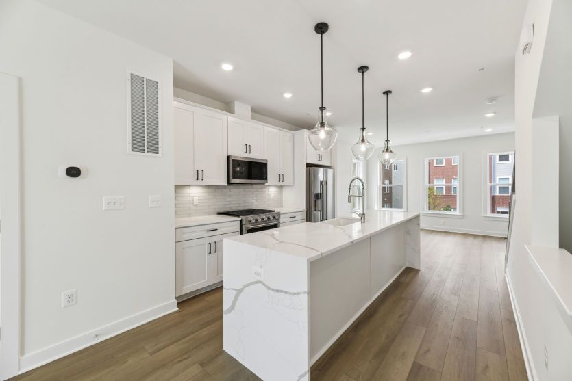 Kitchen with Cascade Island - Actual Home