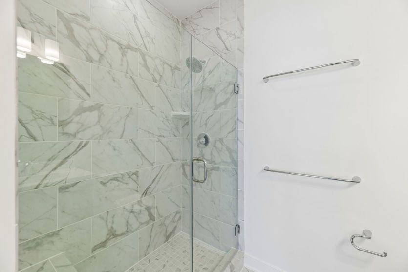 Frameless Glass Shower in the Owner's Suite - Actual Home