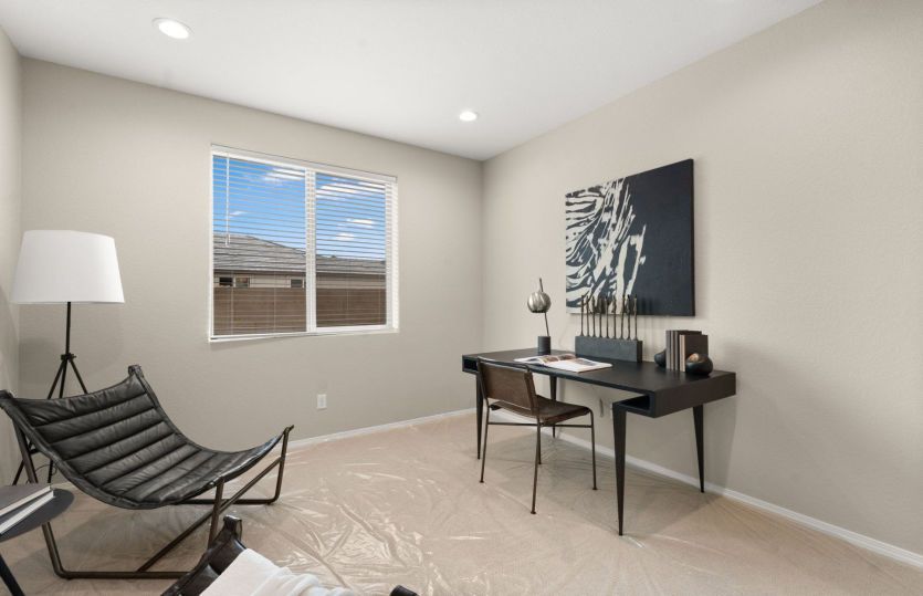 Naturally well-lit den perfect for an office or work space