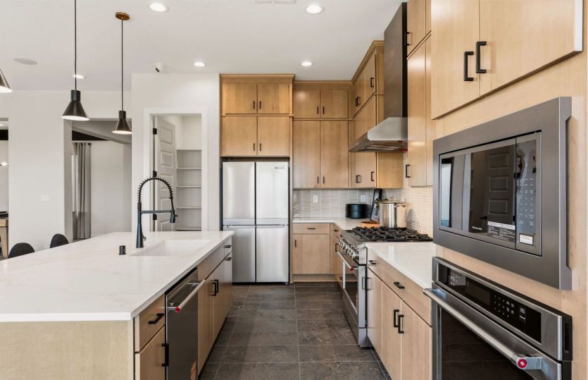 The beautiful Ravenna kitchen with designer details like an executive island and Chef Kitchen.