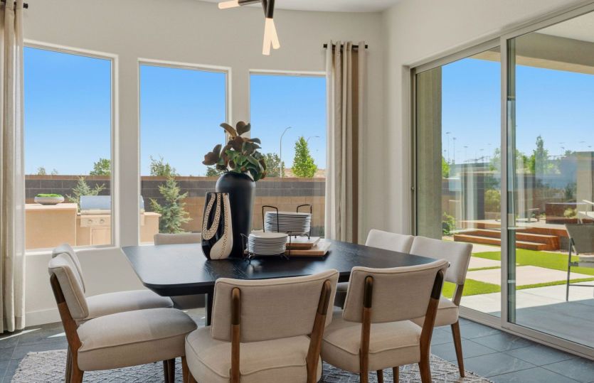 Cafe off of the kitchen provides a naturally well-lit space for family meals or casual dining.