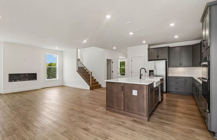 Kitchen Opens to the Café and Gathering Room - Actual Home