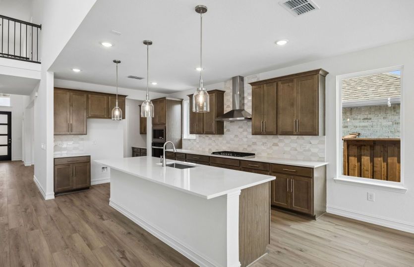 Kitchen with pendent lighting