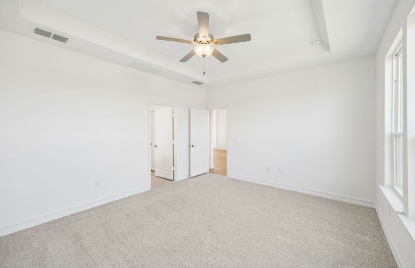 Spacious primary bedroom