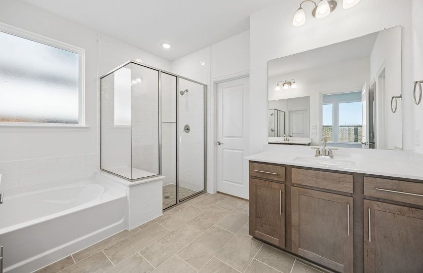 Primary bath with separate tub and shower