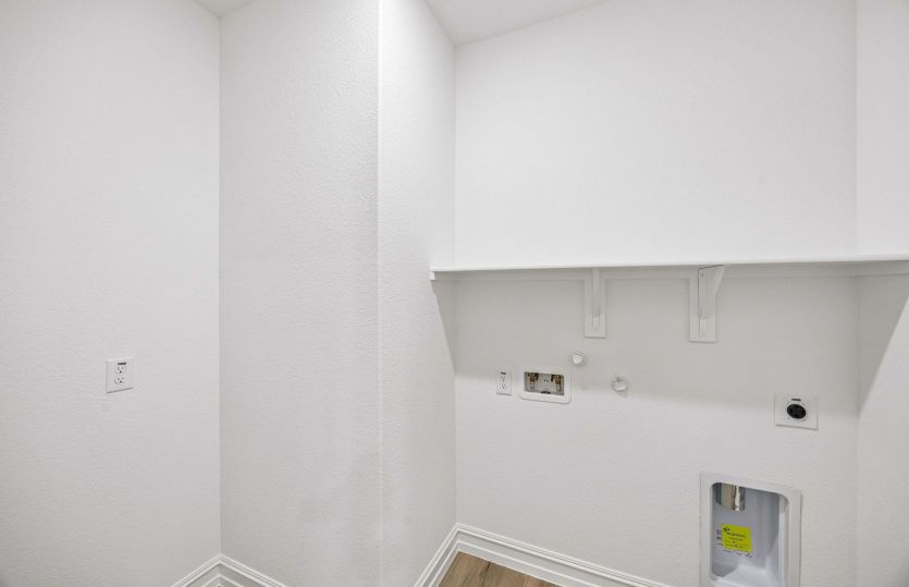 Built-in shelving in laundry room