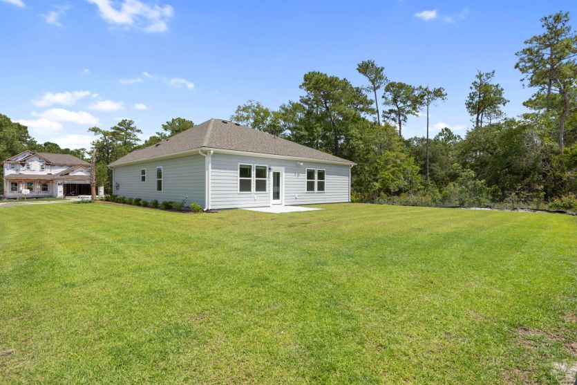 Private backyard with outdoor living potential.